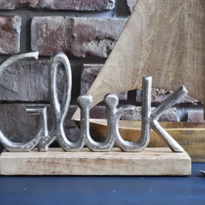 Deko-Aufsteller mit Metallschrift "GLÜCK" Schriftzug