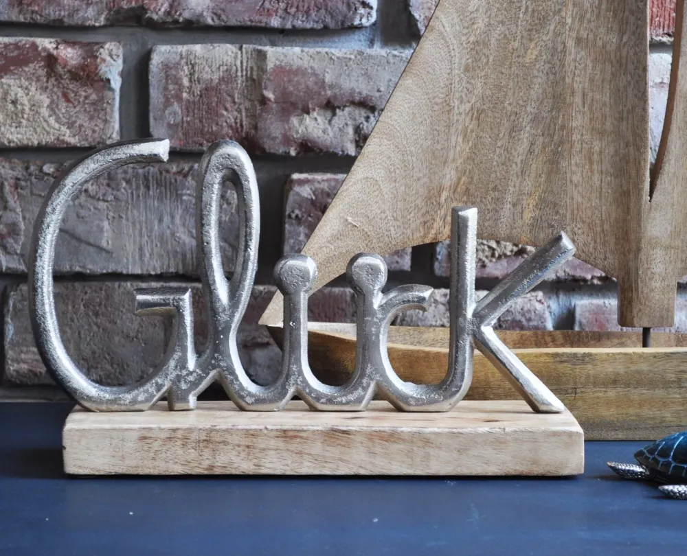 Deko-Aufsteller mit Metallschrift "GLÜCK" Schriftzug