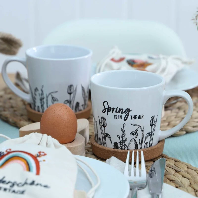 Spring is air Tasse mit Kork Untersetzer Papierdrachen