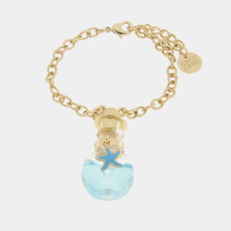 Metallarmband mit Flaschenöffner und blauem Stern