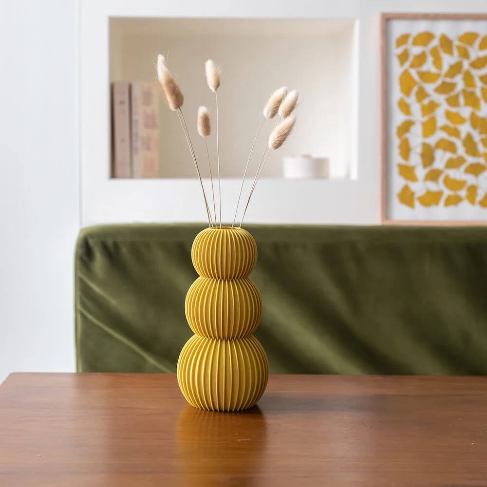 Flammende gelbe Vase