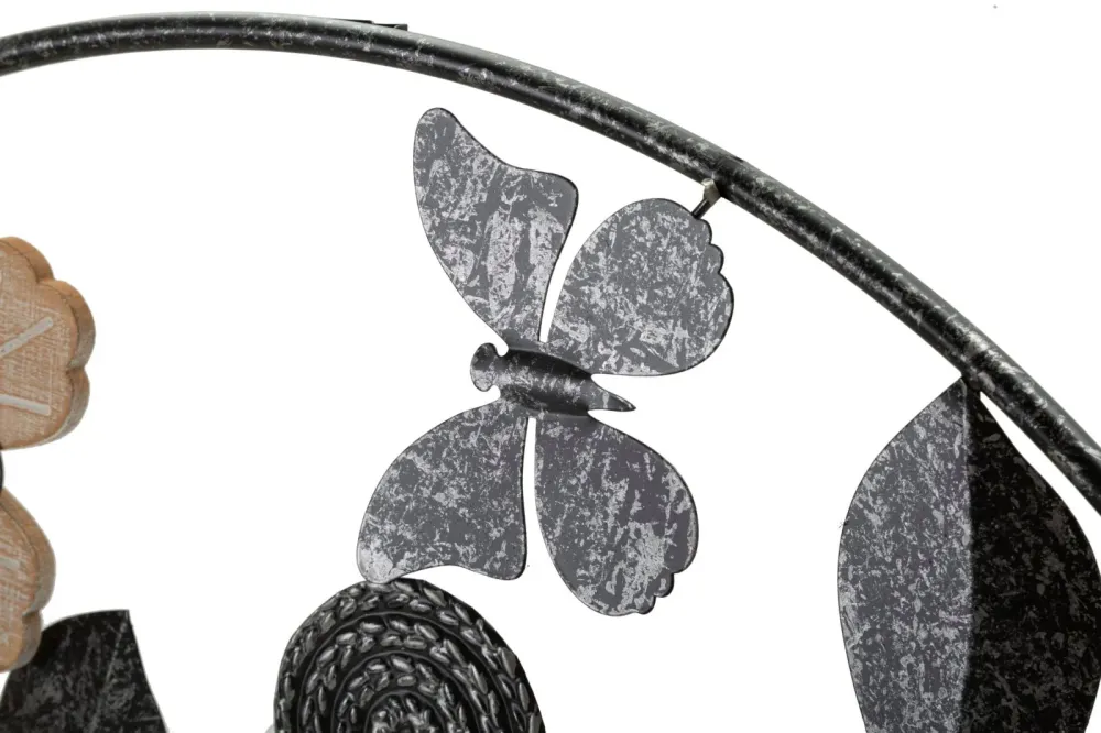 Schwarze Metall- und Holz-Wanduhr mit Blumenmuster